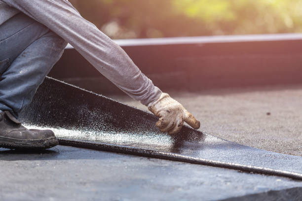 Professional Basement Waterproofing technician working in Lindenhurst, NY